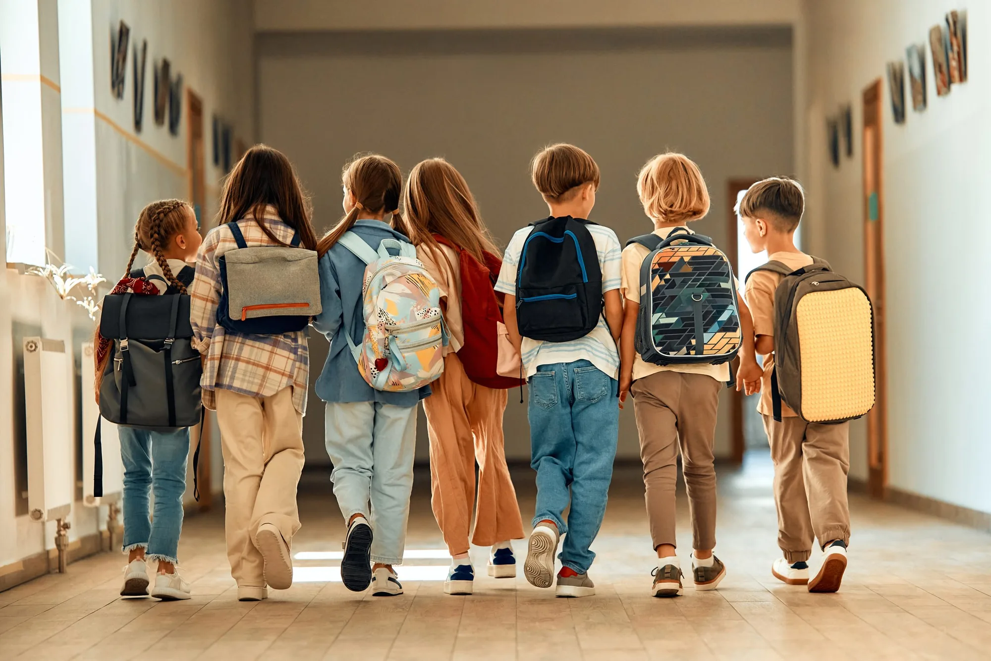 children learning in a school protected by HQE Systems and their integration of AI Artificial Intelligence and ML Machine Learning.