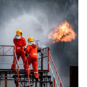 Firefighters fighting gas and oil refinery fire that alerted the fire department because of SiSA life saving emergency mass notification technology integrated in by HQE Systems.