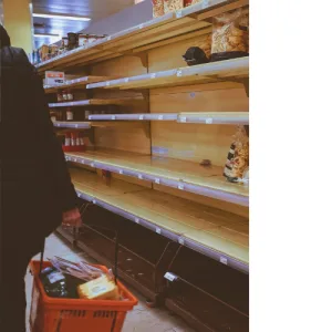 Grocery store with food shortage due to polycrisis that has happened.