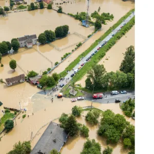 Flooding in street during 2024 that affects utilities industry.