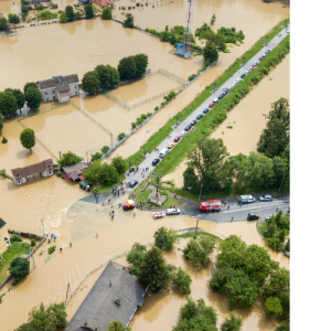 Flooding in street during 2024 that affects utilities industry.