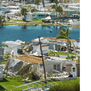 Building damage from hurricane destroys houses, in need of HQE Systems serives for unified emergency mass notification and life safety emergency response. 