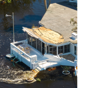 Building damage from hurricane destroys houses, in need of HQE Systems serives for unified emergency mass notification and life safety emergency response. 